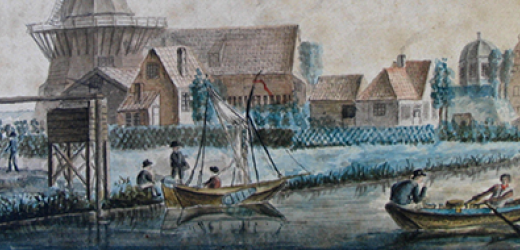 Bootjes op het water met een molen op de achtergrond