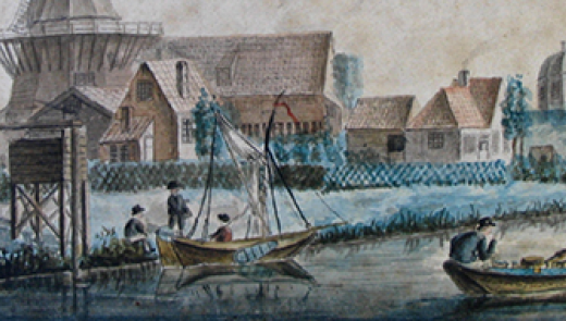 Bootjes op het water met een molen op de achtergrond